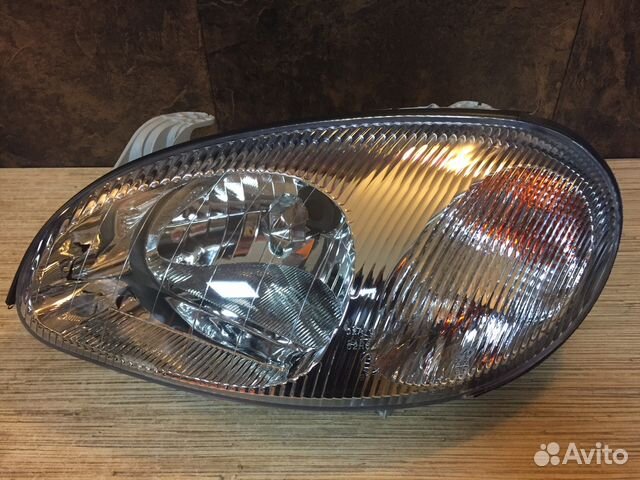 Фара левая новая неоригинал Шевроле Ланос