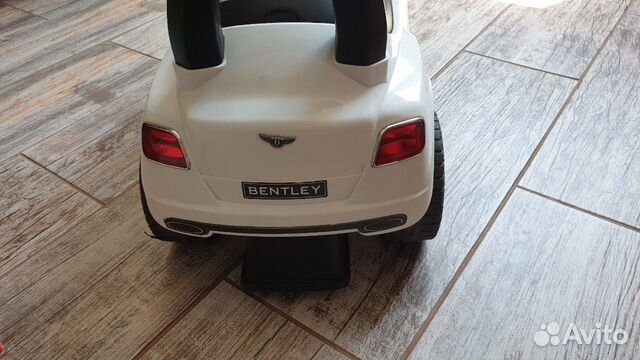 Машинка-каталка музыкальная