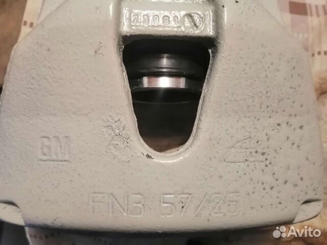 Суппорт Опель Астра Н, левый в сборе