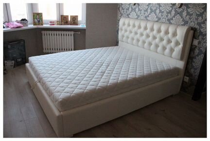 Кровать с подъемным механизмом