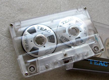 Аудиокассеты с катушками бобинками Teac серебристы