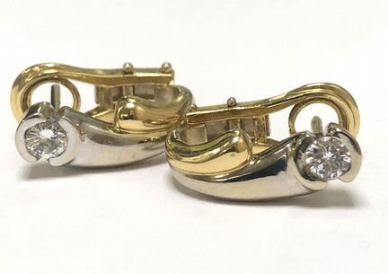 Золотые серьги 750 пробы с бриллиантами