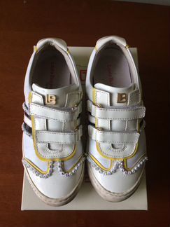 Blumarine, Prada, Laura